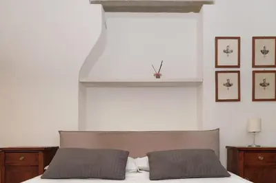 Letto o letti in una camera di Borgo San Frediano Apartments Lab & Suite