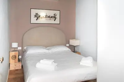 Letto o letti in una camera di Erta Apartments Flat & Suite