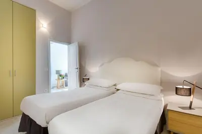 Letto o letti in una camera di Apartments Florence- Alfani Views