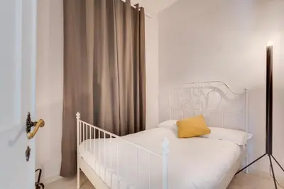 Letto o letti in una camera di Apartments Florence- Alfani Views