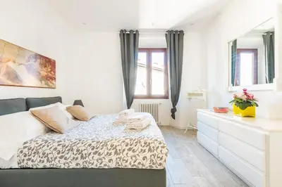 Letto o letti in una camera di Dome House, Florence