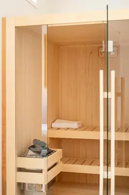 Letto o letti in una camera di GOLDEN LUXE - Sauna and Jacuzzi Duomo View Extra Luxe