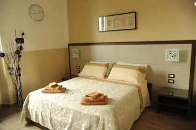 Letto o letti in una camera di Guesthouse Buonarroti Florence