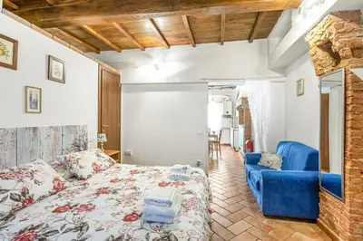 Letto o letti in una camera di GuestHost - San Giorgio Tiny Gem near Ponte Vecchio