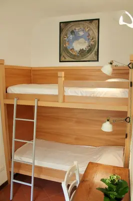 Letto o letti a castello in una camera di Antica Vigna in Santa Croce