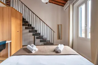 Letto o letti in una camera di Scandicci Elite Home - Casa Moderna con Cortile e Parcheggio Gratuito