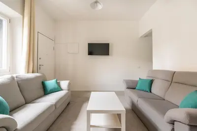 Area soggiorno di Scandicci Elite Home - Casa Moderna con Cortile e Parcheggio Gratuito