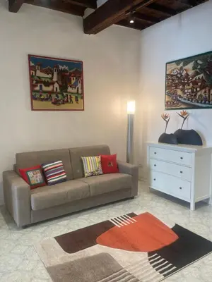 Area soggiorno di Michelangiolo Appartment