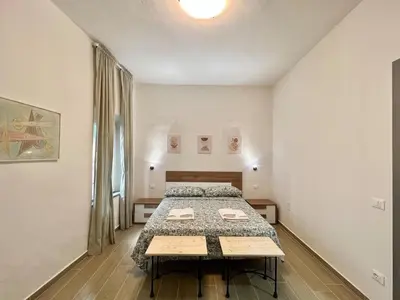 Letto o letti in una camera di Casa S Trinita 15 min train station, visit Tuscany
