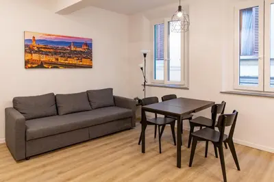 Area soggiorno di Charming & Modern Apartment near Santo Spirito