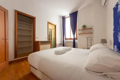 Letto o letti in una camera di Don Minzoni Quiet Haven