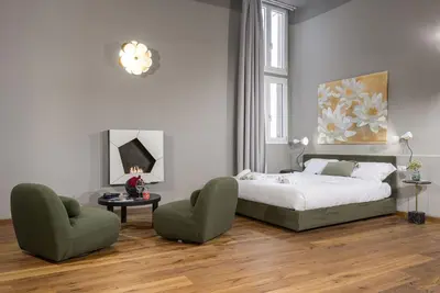 Letto o letti in una camera di UNYCA - Florence Luxury Atelier