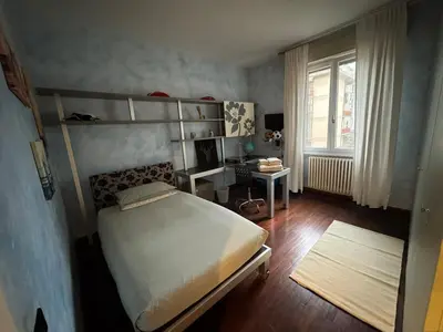 Letto o letti in una camera di Casa Leo