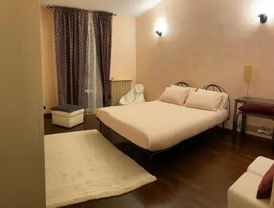 Letto o letti in una camera di Casa Leo