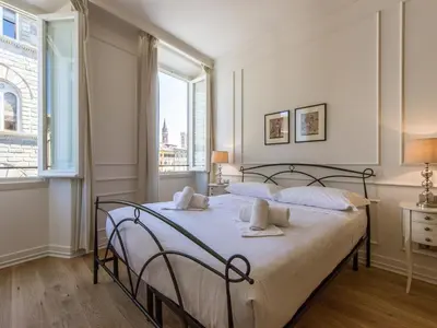 Letto o letti in una camera di SIGNORIA VIEW- Scenic Overlooking Loft