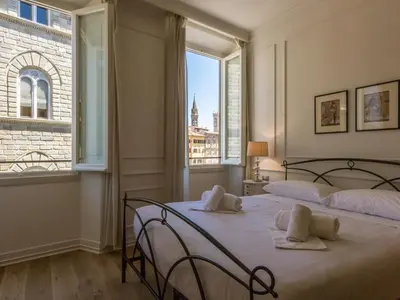 Letto o letti in una camera di SIGNORIA VIEW- Scenic Overlooking Loft