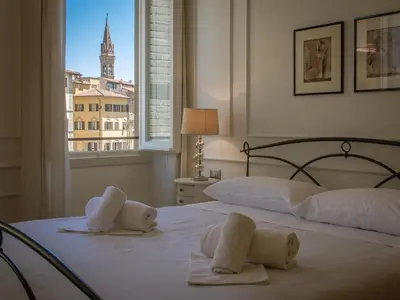 Letto o letti in una camera di SIGNORIA VIEW- Scenic Overlooking Loft