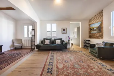 Area soggiorno di Santa Maria Novella penthouse by MMega