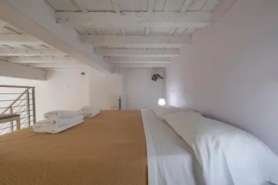 Letto o letti in una camera di Signoria Square Apartment