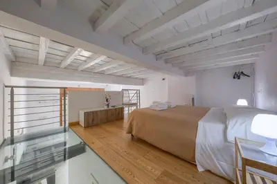 Letto o letti in una camera di Signoria Square Apartment
