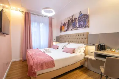 Letto o letti in una camera di Corte dell'Albero
