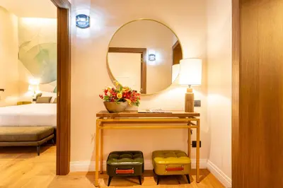Letto o letti in una camera di Palazzo Don Minzoni