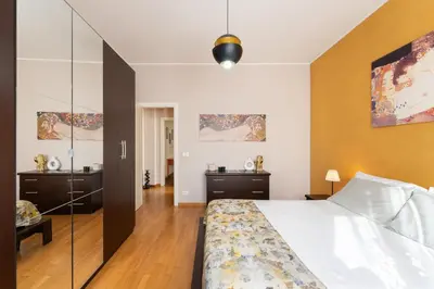 Letto o letti in una camera di Casa Serena Firenze