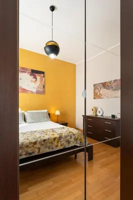 Letto o letti in una camera di Casa Serena Firenze