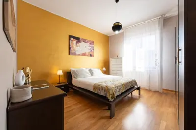 Letto o letti in una camera di Casa Serena Firenze