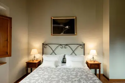 Letto o letti in una camera di Suite Aria at Villa Santa Lucia Nuova
