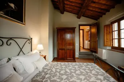 Letto o letti in una camera di Suite Aria at Villa Santa Lucia Nuova