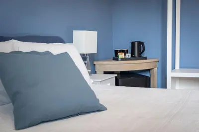 Letto o letti in una camera di Urban 36 Boutique Rooms