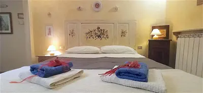 Letto o letti in una camera di Amo e Flo