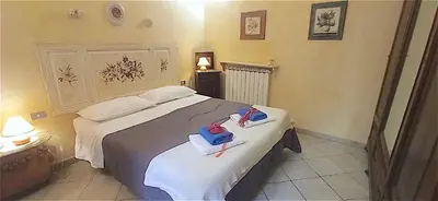 Letto o letti in una camera di Amo e Flo