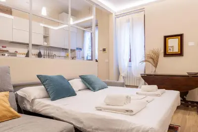 Area soggiorno di Sant'Ambrogio Elegant Apartment