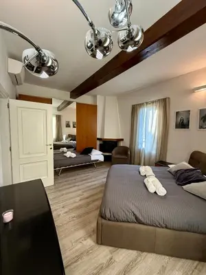 Letto o letti in una camera di Amazing Florence House