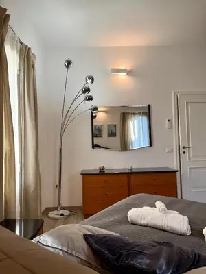 Letto o letti in una camera di Amazing Florence House