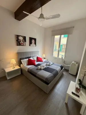 Letto o letti in una camera di Amazing Florence House