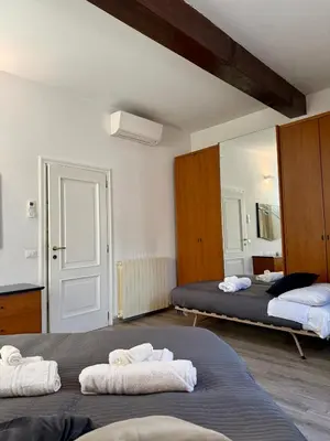 Letto o letti in una camera di Amazing Florence House