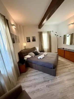 Letto o letti in una camera di Amazing Florence House