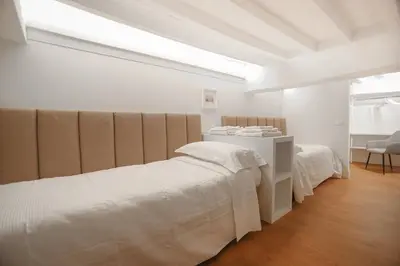 Letto o letti in una camera di Bargello Nine Luxury Suite