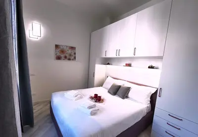 Letto o letti in una camera di Del Re Florence Home