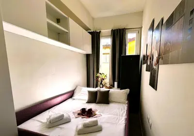 Letto o letti in una camera di Del Re Florence Home
