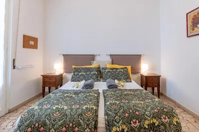 Letto o letti in una camera di Casa Elena in Florence