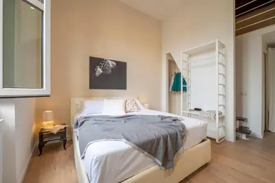 Letto o letti in una camera di Golden House San Lorenzo