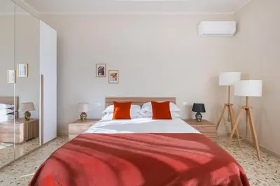 Letto o letti in una camera di The Batoni Apartment