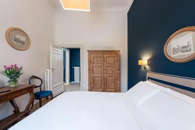 Letto o letti in una camera di Residenza Strozzi