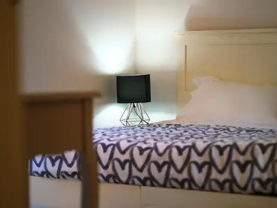 Letto o letti in una camera di 3 Gigli Florence