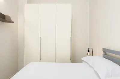 Letto o letti in una camera di 3 Gigli Florence