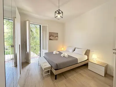 Letto o letti in una camera di Suite Borgo Verde-5 minutes from the station